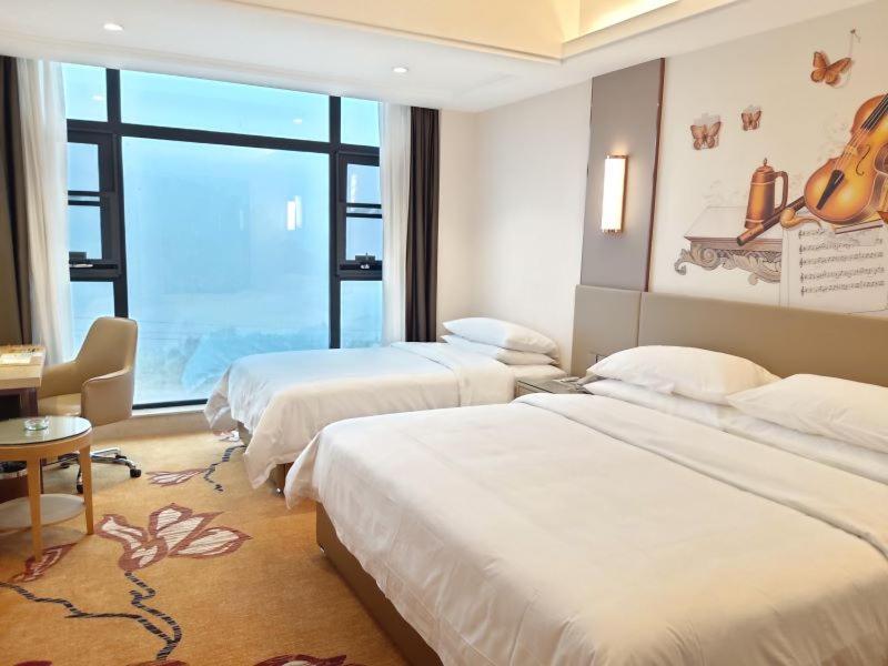 Vienna Hotels Jinghong Luaran gambar